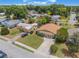 Street view of single story home with green lawn, carport, and mature landscaping in a residential neighborhood at 3823 Martin St, Orlando, FL 32806