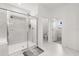 Modern bathroom showcases glass enclosed shower with tile surround and sleek fixtures at 4216 Jespersen St, Apopka, FL 32712