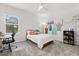 Inviting bedroom features natural light, modern furnishings, and decor creating a cozy atmosphere at 4216 Jespersen St, Apopka, FL 32712