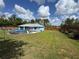 Lush backyard featuring a pool, patio set, fence, and lovely lawn space at 4382 Sw 171St Pl, Ocala, FL 34473