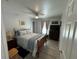 Cozy bedroom with a queen-size bed, ceiling fan, and neutral decor, creating a relaxing and comfortable retreat at 4382 Sw 171St Pl, Ocala, FL 34473
