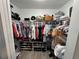 Organized walk-in closet with shelving and rods for ample storage, keeping belongings tidy and accessible at 4382 Sw 171St Pl, Ocala, FL 34473