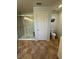 Bright bathroom with a glass shower stall, toilet and tile floor at 439 Sunfish Dr, Winter Haven, FL 33881