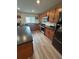 Well-equipped kitchen with stainless steel appliances, dark countertops, updated cabinets and a subway tile backsplash at 439 Sunfish Dr, Winter Haven, FL 33881
