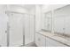 Bathroom features double sinks, granite countertops, and a glass-enclosed shower at 4545 Cross Prairie Pkwy, St Cloud, FL 34772