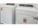 A close up view of white Whirlpool washer and dryer appliances at 4545 Cross Prairie Pkwy, St Cloud, FL 34772