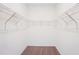 Walk-in closet with carpeting and wire shelving for optimal organization at 4545 Cross Prairie Pkwy, St Cloud, FL 34772