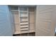 Spacious closet with custom shelving, drawers, and ample storage, offering organization and convenience at 4875 Lacewing Dr, Winter Garden, FL 34787