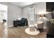 Cozy home office with a desk, comfortable chair, accent chair, and modern decor providing an inviting workspace at 4875 Lacewing Dr, Winter Garden, FL 34787