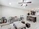 Open living space with ceiling fan, tile floors, comfortable seating and natural light at 509 Artisan St # 43, Orlando, FL 32824