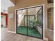 A bright atrium featuring greenery, and providing a view into other areas of the home at 600 Fallsmead Cir, Longwood, FL 32750