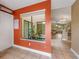 Bright foyer featuring a large window with view to an atrium, and ceramic tile floors at 600 Fallsmead Cir, Longwood, FL 32750