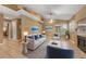 Cozy living area featuring a fireplace, neutral paint, and vaulted ceilings at 600 Fallsmead Cir, Longwood, FL 32750