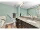 Bathroom boasts marble accents, a glass shower, double sinks, and modern fixtures at 6144 Avenue G, Mc Intosh, FL 32664