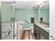 Bathroom features a soaking tub with marble surround, shower, and double sink vanity at 6144 Avenue G, Mc Intosh, FL 32664