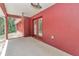 Covered patio with ceiling fans overlooks a private, wooded backyard at 6144 Avenue G, Mc Intosh, FL 32664