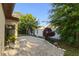 Private back yard with paver patio and lush landscaping at 7027 Villa Estelle Drive, Orlando, FL 32819
