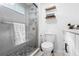Elegant bathroom featuring a glass shower, modern toilet, and vanity with stylish hardware at 7027 Villa Estelle Drive, Orlando, FL 32819