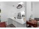 Well-lit kitchen featuring a large center island, sleek countertops, and stainless steel appliances at 7027 Villa Estelle Drive, Orlando, FL 32819