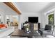 Spacious living room with modern furniture, recessed lighting, and an open floor plan at 7027 Villa Estelle Drive, Orlando, FL 32819