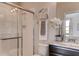 Bathroom featuring glass shower, stylish vanity, and modern fixtures for your comfort at 7237 Nottingham Reel Ct, St Cloud, FL 34773