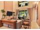 Bright living room with large windows, comfortable seating, and stylish decor at 7645 Recife Dr, Kissimmee, FL 34747