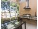Enjoy outdoor dining with a kitchen featuring a grill, sink and serving area at 7645 Recife Dr, Kissimmee, FL 34747