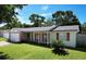 Charming single-story home featuring a well-maintained front lawn, brick accents, and a cozy, welcoming facade at 808 Woodling Pl, Altamonte Springs, FL 32701