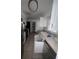 View of a kitchen with essential appliances and ample cabinet space, ready for a personal touch at 808 Woodling Pl, Altamonte Springs, FL 32701