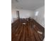Spacious living room featuring hardwood flooring, bright natural light, and a clean, inviting atmosphere at 808 Woodling Pl, Altamonte Springs, FL 32701
