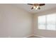 Neutral bedroom with a ceiling fan, large window, and carpet flooring is move in ready at 810 Greybull Run, Lake Mary, FL 32746