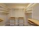 Walk-in closet with custom shelving provides ample storage space and organization at 810 Greybull Run, Lake Mary, FL 32746