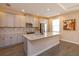 Modern kitchen with granite counters, stainless steel appliances, and a mosaic backsplash at 810 Greybull Run, Lake Mary, FL 32746