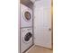 Laundry area with stacked washer and dryer unit at 810 Greybull Run, Lake Mary, FL 32746