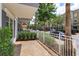 Street view of a condo complex with trees and landscaping along the sidewalk at 810 Greybull Run, Lake Mary, FL 32746