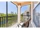 Balcony with scenic views and relaxing outdoor seating at 8296 Portofino Dr # 405, Davenport, FL 33896