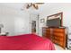 Bedroom boasting an en-suite bath and television at 8296 Portofino Dr # 405, Davenport, FL 33896