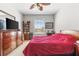 Comfortable bedroom with natural light and tasteful decor at 8296 Portofino Dr # 405, Davenport, FL 33896