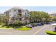 Attractive condominium building with parking and beautiful landscaping at 8296 Portofino Dr # 405, Davenport, FL 33896