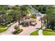 Well-maintained community entrance featuring lush landscaping and a welcoming, decorative structure at 8296 Portofino Dr # 405, Davenport, FL 33896