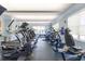 Community fitness room with modern treadmills and stationary bikes for residents' use at 8296 Portofino Dr # 405, Davenport, FL 33896
