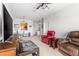 Open living room with plush furniture and neutral carpet at 8296 Portofino Dr # 405, Davenport, FL 33896