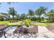 Putting green with lush landscaping and multiple holes for practicing your short game at 8296 Portofino Dr # 405, Davenport, FL 33896
