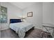 Bedroom with a bed, a desk, and a window that lets in plenty of natural light at 849 Shadowmoss Dr, Winter Garden, FL 34787