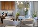 Breakfast nook featuring glass table, 4 chairs, and sliding glass door to the lanai at 849 Shadowmoss Dr, Winter Garden, FL 34787
