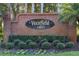Community entrance sign for Westfield Lakes with manicured landscaping at 849 Shadowmoss Dr, Winter Garden, FL 34787