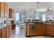 Well-appointed kitchen featuring stainless steel appliances and a cozy breakfast nook with sliding glass door at 849 Shadowmoss Dr, Winter Garden, FL 34787