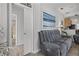 Cozy living room with comfortable seating, adjacent to the kitchen, and plenty of natural light at 849 Shadowmoss Dr, Winter Garden, FL 34787