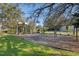 Community playground area with swings, slides, and play equipment for children at 849 Shadowmoss Dr, Winter Garden, FL 34787