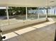 Enclosed porch offers a screened area and tile floors at 855 Marion Dr, Mount Dora, FL 32757